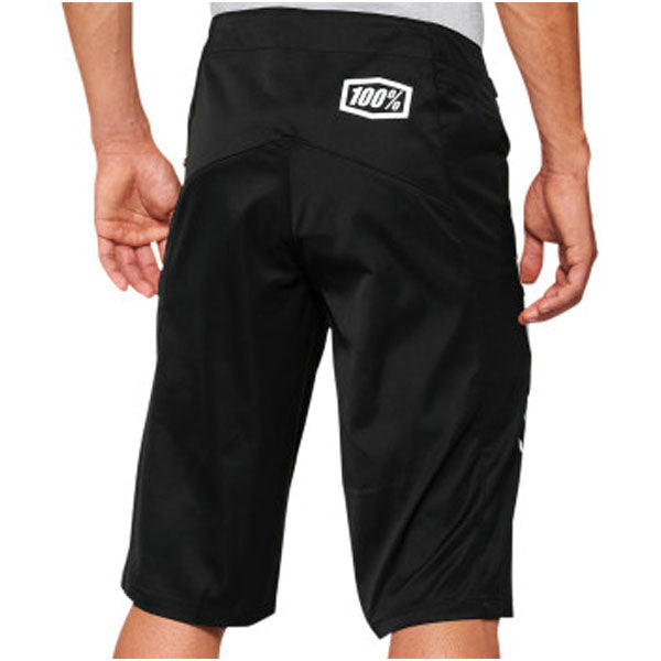 Studio product photo on a neutral background of 100%, R-Core Shorts (MTB), SKU 50010160, color Black, sizes 28–38, Designed for Mountain Bike, BMX and E-Bike riders