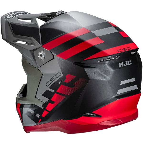 A full-face motocross helmet with a sleek, aerodynamic design, predominantly black with bold red and gray geometric accents and stripes, featuring the model number 'C50' on the side and the brand 'HJC' on the front. The helmet has a matte finish, with a prominent visor at the top, and vents integrated into the design for airflow. The background is plain white, emphasizing the helmet's modern, sporty appearance, with soft lighting that highlights its contours and matte texture.