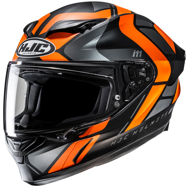 A full-face motorcycle helmet with a sleek aerodynamic design, predominantly black with vibrant orange and gray accents, featuring the HJC logo on the front and the model number 'i11' on the side. The helmet has a clear visor, ventilation vents on top and chin areas, and detailed graphics with sharp lines and contrasting colors. It is photographed against a plain white background, with lighting highlighting its glossy finish and intricate details, giving it a professional, high-performance appearance. - alternate view