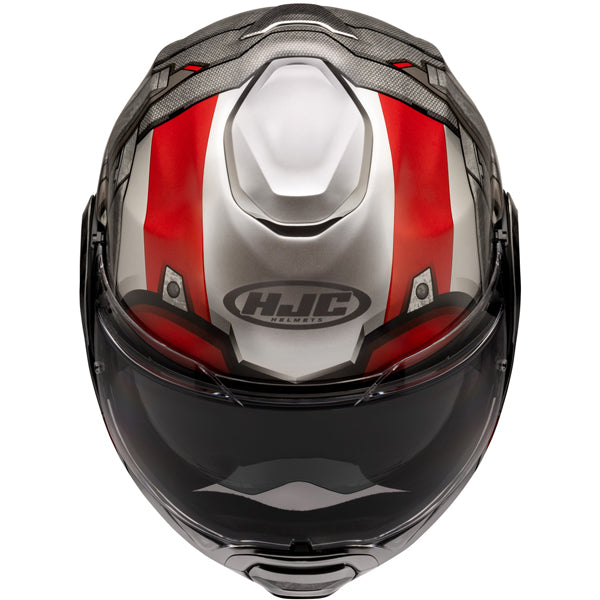 A full-face motorcycle helmet with a sleek aerodynamic design, predominantly silver with bold red stripes running vertically on each side, and black accents around the visor and top. The helmet features a clear, tinted visor covering the front, with a prominent white vent on the top center. The brand logo 'HJC Helmets' is displayed on the front lower part of the helmet. The surface has a smooth, glossy finish with subtle textured details on the top and sides, set against a plain white background, emphasizin