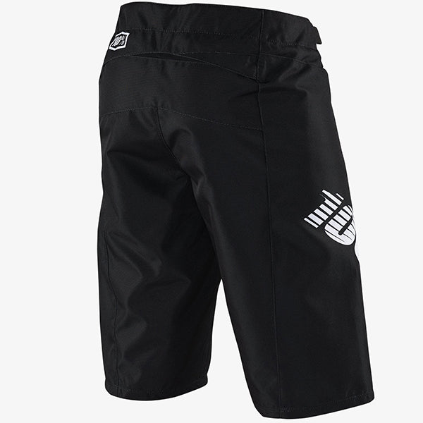 Studio photo showcasing 100%, R-Core Short (Youth) (MTB), Shorts, SKU 47601-001-24, color Black, sizes 22–28, Designed for Mountain Bike, BMX and E-Bike riders
