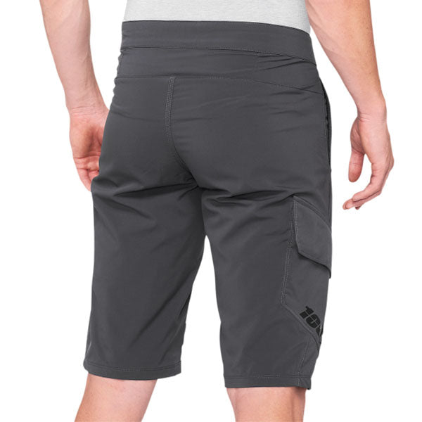 High-resolution studio image of 100%, Ridecamp Short (MTB), Shorts, SKU 50010014, color options Black, Charcoal, Navy, sizes 28–38, Designed for Mountain Bike, BMX and E-Bike riders
