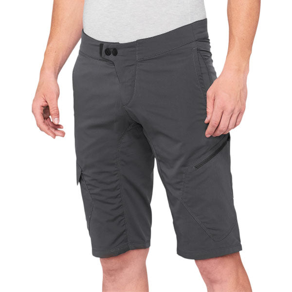 Clean studio photo on a white background of 100%, Ridecamp Short (MTB), Shorts, SKU 50010013, color options Black, Charcoal, Navy, sizes 28–38, Designed for Mountain Bike, BMX and E-Bike riders