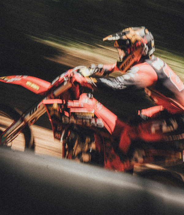 Motocross rider in action with a blurred background 100% Goggles collection