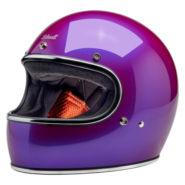 High-resolution studio image of Biltwell, Gringo Helmet, Biltwell, motorcycle helmet, metallic, angled view, showing smooth shell profile, ventilation ports, and padded chin strap for rider comfort. SKU '010116320., Colors: Black, Flat Black, Metallic Grape, SKU 0101163