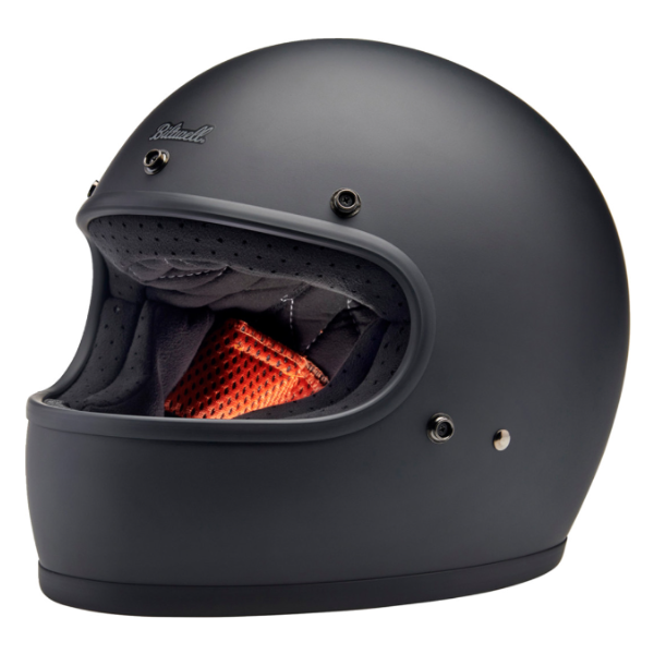 Clean studio shot of Biltwell, Gringo Helmet, Biltwell, motorcycle helmet, black, angled view, showing smooth shell profile, ventilation ports, and padded chin strap for rider comfort. SKU '010116314., Colors: Black, Flat Black, Metallic Grape, SKU 0101163