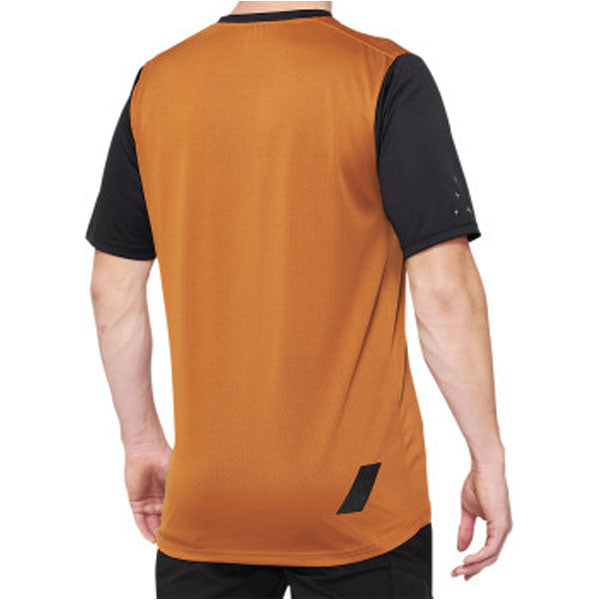 Catalog studio image of 100%, Ridecamp Jersey (MTB), SKU 51200229, color options Charcoal/Black, Terracotta/Black, Blue/Navy, sizes SM, MD, LG, XL, Designed for Mountain Bike, BMX and E-Bike riders