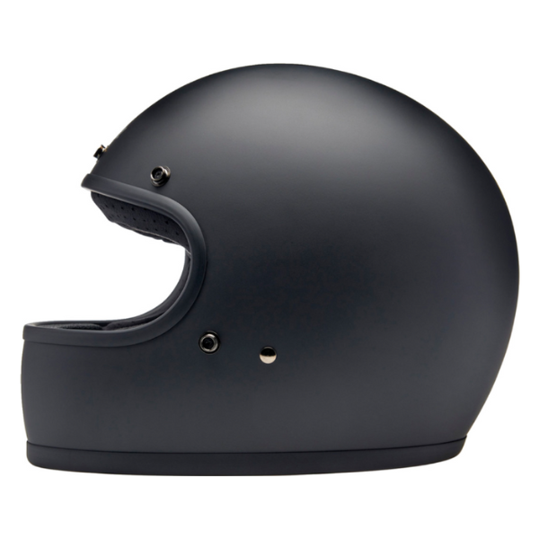 Professional studio photo of Biltwell, Gringo Helmet, Biltwell, motorcycle helmet, black, showing smooth shell profile, ventilation ports, and padded chin strap for rider comfort. SKU '010116315., Colors: Black, Flat Black, Metallic Grape, SKU 0101163