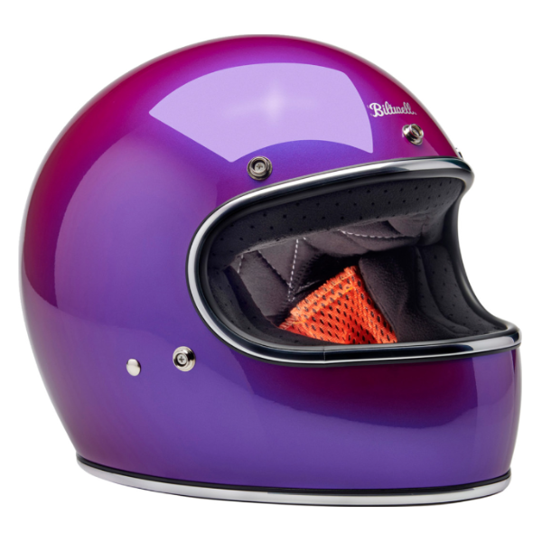 Studio product photo on a white background of Biltwell, Gringo Helmet, Biltwell, motorcycle helmet, metallic, angled view, showing smooth shell profile, ventilation ports, and padded chin strap for rider comfort, Colors: Black, Flat Black, Metallic Grape, SKU 0101163