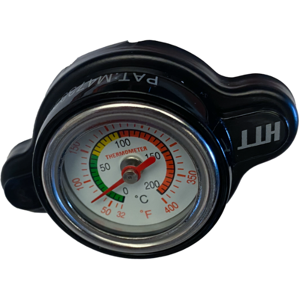 Clean studio shot of Fire Power, Radiator Caps with Temperature Gauge, showing product profile and surface details, Colors: Most Japanese Models, Blue, 26psi (1.8KG), Most KTM/Husqvarna up to 2015, Blue, 26psi (1.8KG), Most KTM/Husqvarna '16+, Black, 28.5psi (2.0KG), SKU 57-145