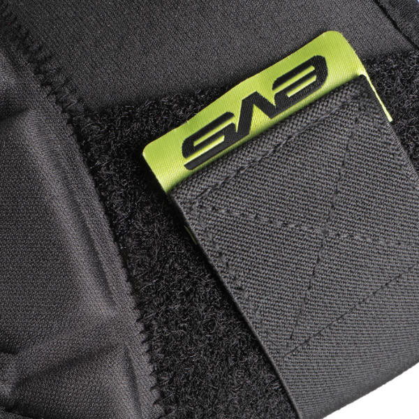 Studio product photo on a white background of EVS, TP199 Knee/Shin Guards, side view, Colors: Black/Hi Vis, SKU 663-1438S
