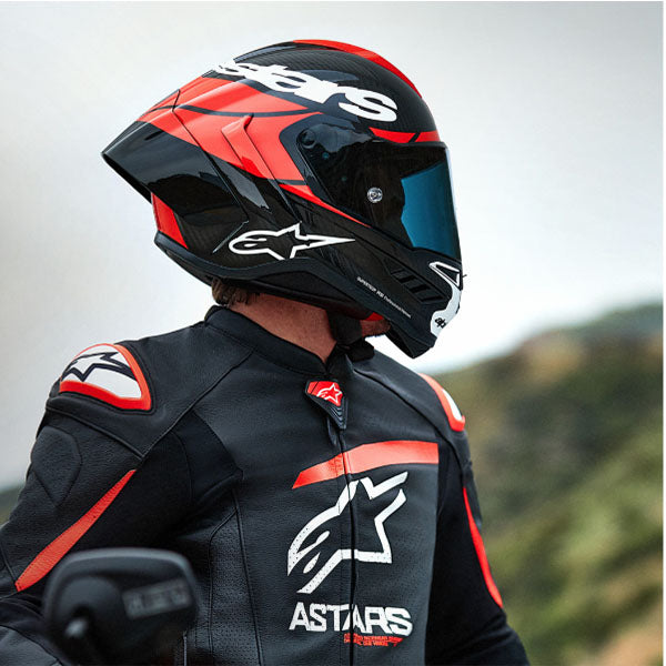 Carbon/Red/White product view, lightweight off‑road motorcycle helmet with ventilation and impact protection