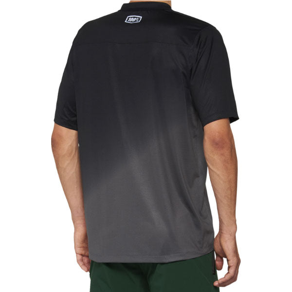 Studio image on a white background of 100%, Celium Jersey (MTB), SKU 50200068, color Black/Charcoal, sizes SM, MD, LG, XL, Designed for Mountain Bike, BMX and E-Bike riders