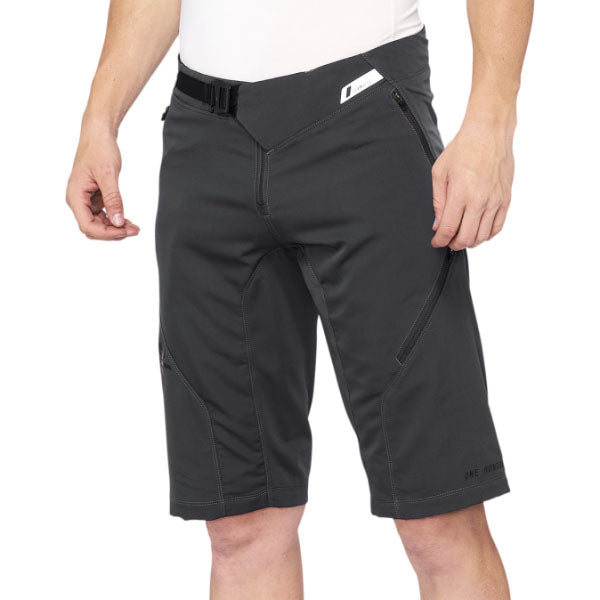 Studio photo of 100%, Airmatic Short (MTB), Shorts, SKU 50010005, color options Black, Charcoal, Navy, sizes 28–38, Designed for Mountain Bike, BMX and E-Bike riders