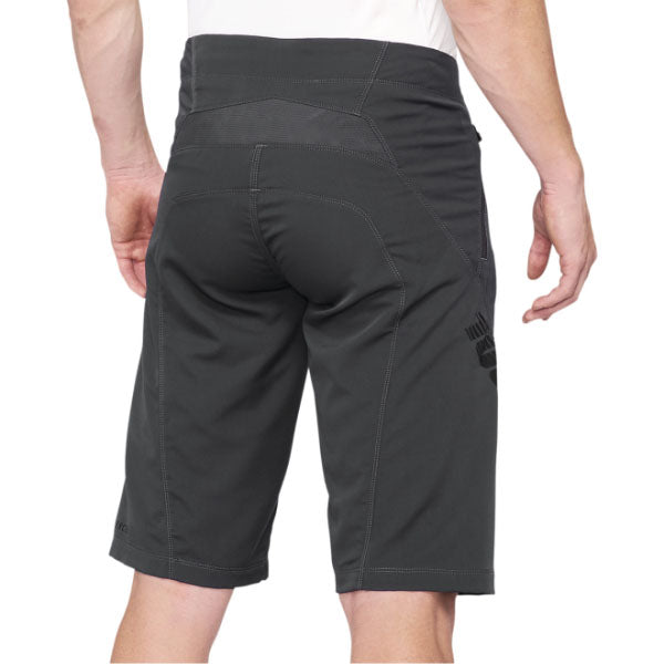 Detailed studio photograph of 100%, Airmatic Short (MTB), Shorts, SKU 50010006, color options Black, Charcoal, Navy, sizes 28–38, Designed for Mountain Bike, BMX and E-Bike riders