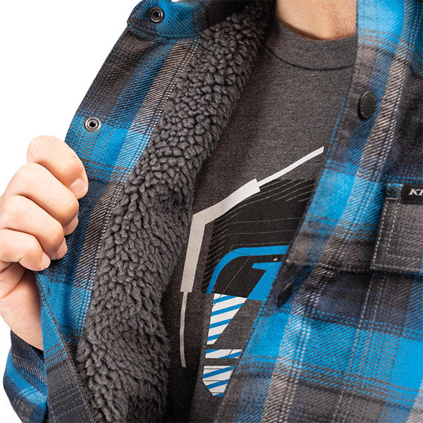 Crisp studio image on a white background of Klim; showing flannel shirt fit, button front, and plaid pattern; SKU 3629-000-140-256