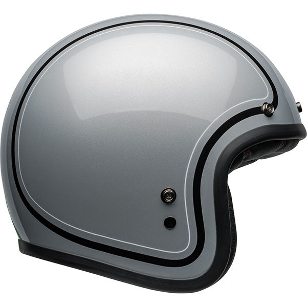 motorcycle helmet, angled view, showing aerodynamic shell design, ventilation ports, and secure retention system built for rider comfort and protection