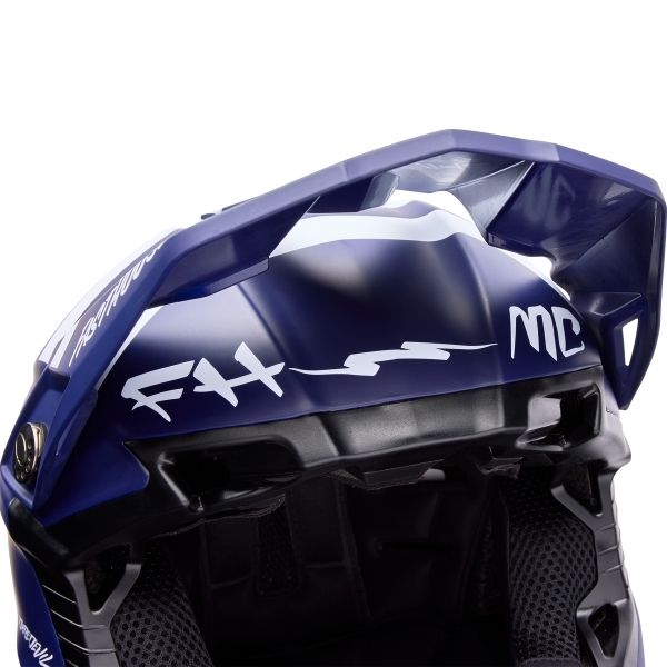 Motorcycle helmet, showing aerodynamic shell design, ventilation ports, and secure retention system built for rider comfort and protection | Bell - Moto-10 Fasthouse MIPS Helmet | SKU 71758 | Colors: Navy | Sizes: XS to 2X | Available at BTO Sports