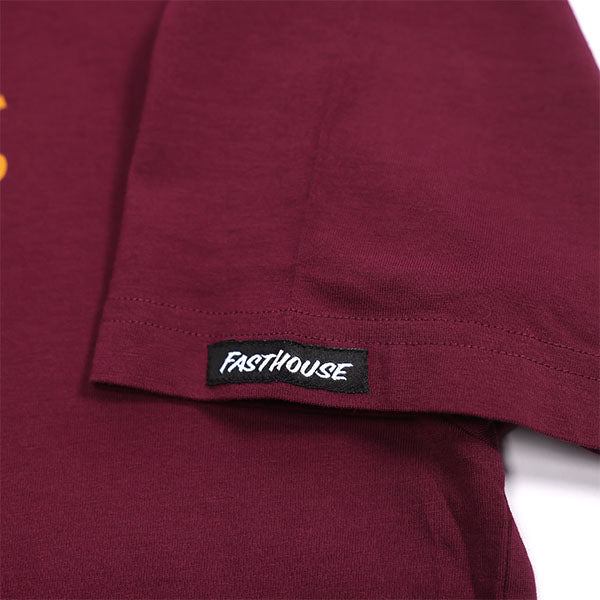 Professional studio photo of Fasthouse Origin Tee; showing tee fit, printed graphics, and crew neckline; SKU 3210000004; Colors: Black, Maroon