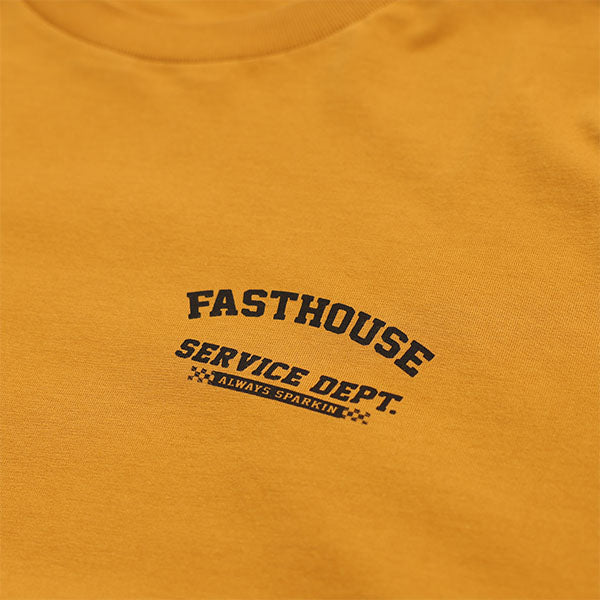 High-resolution studio image of Fasthouse Ignite Tee; showing tee fit, printed graphics, and crew neckline; SKU 3210150004; Colors: Vintage Gold, Black