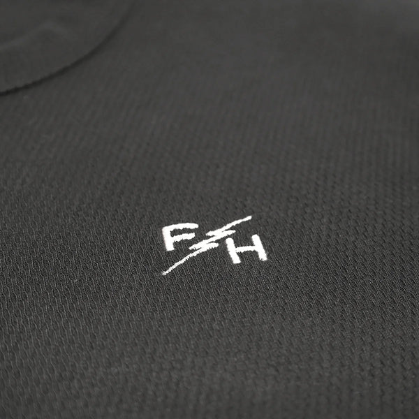 Studio photo on a white background of Fasthouse Luther LS Thermal; showing long-sleeve cut, printed graphics, and crew neckline; SKU 3297570504