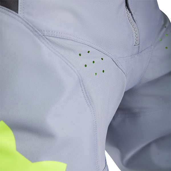 Full-body view of rider wearing White/Red 180 Flow Pants (SKU: 33703-019)