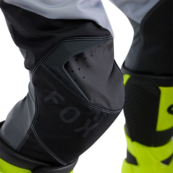 Rear close-up of White/Red 180 Flow Pants (SKU: 33703-019), showing stitching and paneling