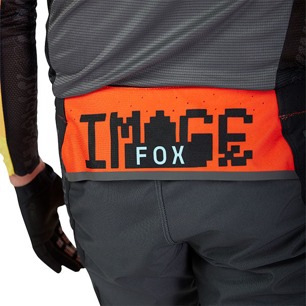Close-up of waistband and buckle system on Fox Racing Flexair Grid Pants in Black and Orange (SKU: 33546-016)