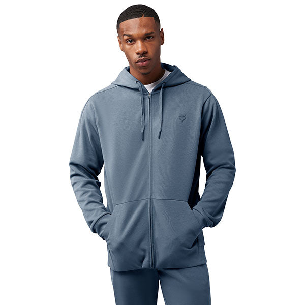 Side view of model wearing Rise Zip Hoodie in Citadel Blue, SKU 33686-332, highlighting mesh vents and performance fleece
