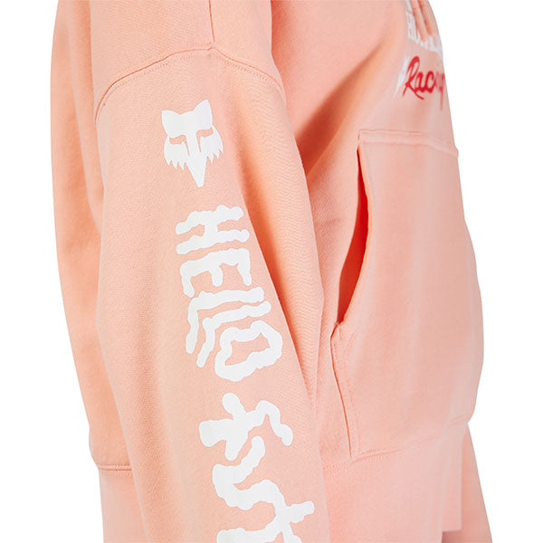 Front-facing lifestyle image of model wearing Pale Pink Fox x Honda Hoodie, SKU 33574-273, with hands in pocket