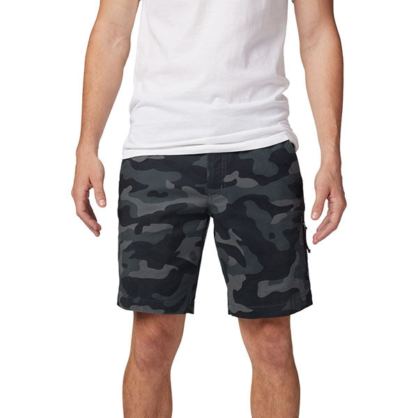 Lifestyle image of model wearing Fox Racing Essex Camo 3.0 Shorts in Black Camo, SKU 31672-247