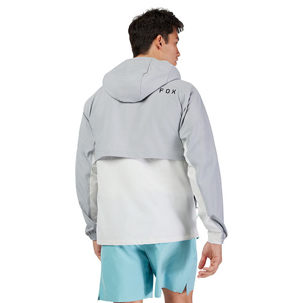Lifestyle image of model wearing Fox Racing Survivalist Windbreaker in Dark Vintage, SKU 32616-172, styled for outdoor performance
