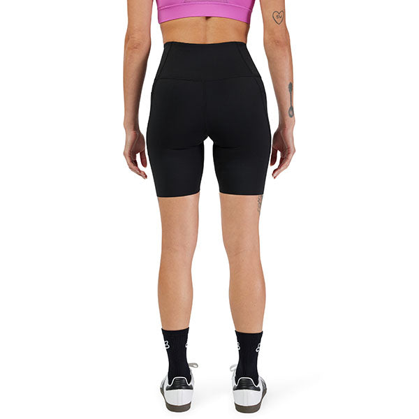 Detail of side pocket and Fox logo on Black Women's Motive Biker Shorts (SKU: 33581-001)