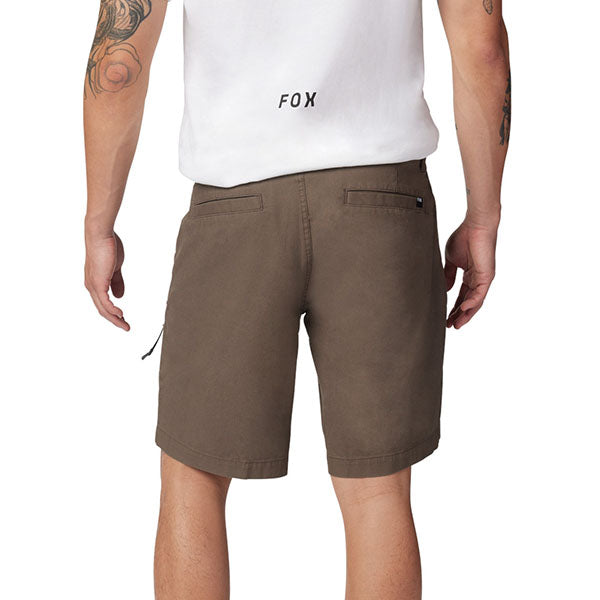 Lifestyle image of model wearing Fox Racing Essex 3.0 Shorts in Dirt Brown, SKU 31667-117