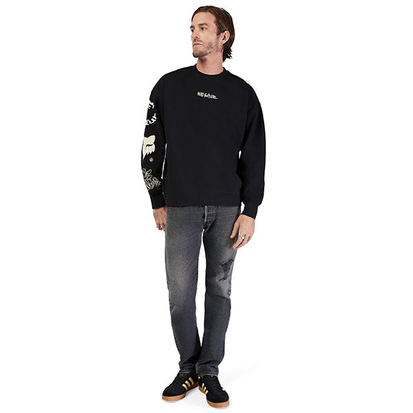Rear view of model wearing Fox Racing Hello Future Crew Pullover in Black, SKU 33379-001, showing full-length fit and collar detail
