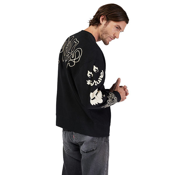Front-facing lifestyle image of model wearing Hello Future Crew Pullover in Black, SKU 33379-001
