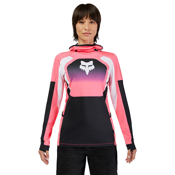 Female model facing front in Pink jersey (SKU: 33547-170), highlighting glove-compatible cuff and side pocket