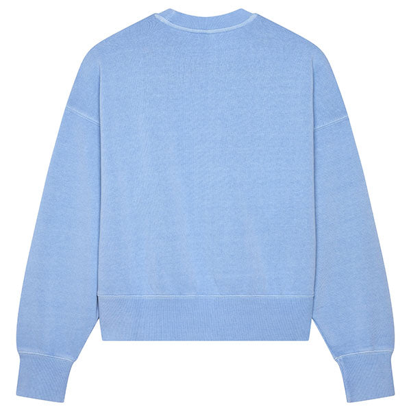 Side profile of Fox Racing Wordmark Oversized Crew Pullover for women in Cashmere Blue (SKU: 33140-381), showing relaxed fit and ribbed cuffs