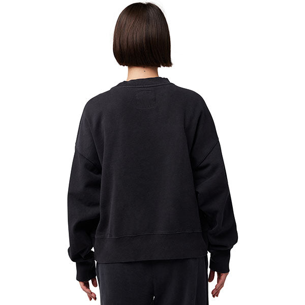 Close-up of tonal Fox wordmark embroidery on Black Women's Wordmark Oversized Crew Pullover (SKU: 33140-001)