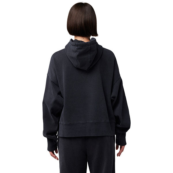 Lifestyle shot of model wearing Fox Racing Wordmark Hoodie in Black, styled for casual comfort