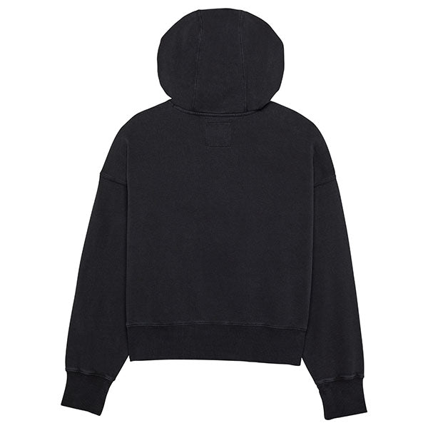 Side view of Fox Racing Women's Wordmark Hoodie in Black, showing oversized fit and soft fleece texture