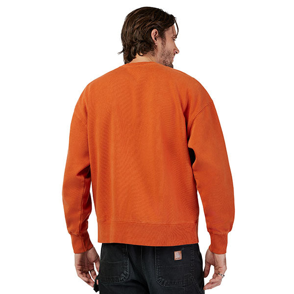 Lifestyle image of model wearing Fox Racing Wordmark Crew Pullover in Light Blue, SKU 33142-633, styled with joggers