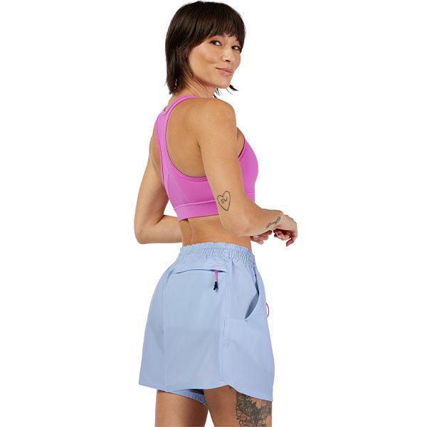 Lifestyle view of Survivalist Shorts in Sea Foam Green styled with matching windbreaker, SKU: 32240-381