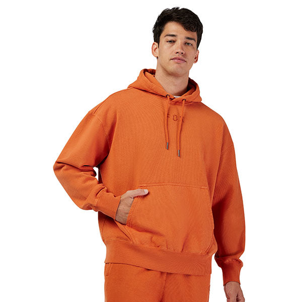Lifestyle image of model wearing Fox Racing Wordmark Hoodie in Light Blue, SKU 32865-633, styled with joggers