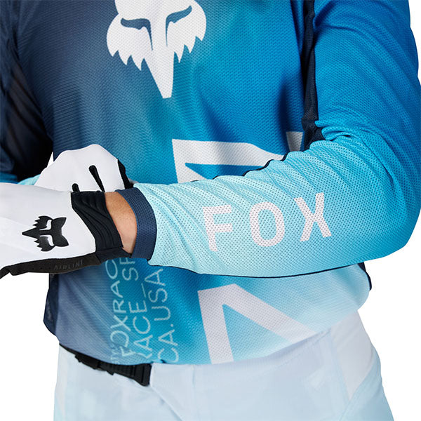Close-up of sleeve graphics and stitching on Teal 180 Air Haze Jersey (SKU: 33536-329)
