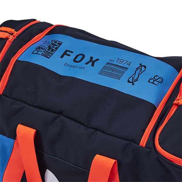Fox Racing Shuttle 180 Race Spec Roller Gearbag SKU 32513 True Blue close-up of HD durable wheels and pull handle
