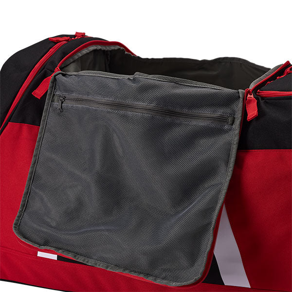 Fox Racing Shuttle 180 Race Spec Roller Gearbag SKU 32513 Flo Red lifestyle photo loaded for race day