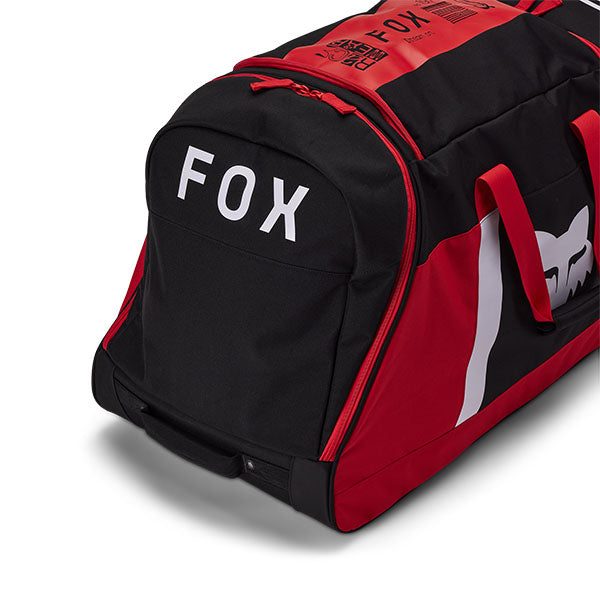 Fox Racing Shuttle 180 Race Spec Roller Gearbag SKU 32513 Flo Red side view showing roller wheels and zippered compartments