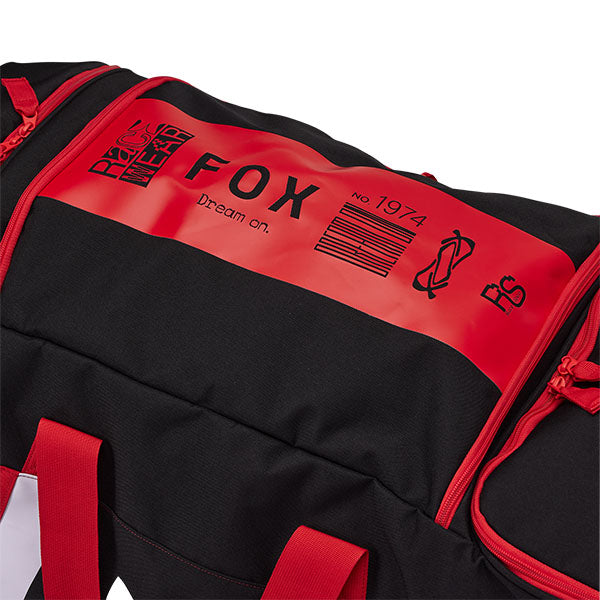 Fox Racing Shuttle 180 Race Spec Roller Gearbag SKU 32513 Flo Red close-up of HD durable wheels and pull handle