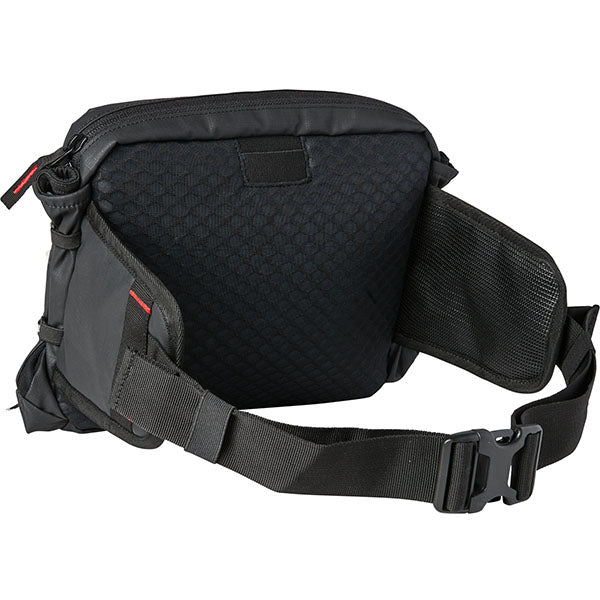 Fox Racing Utility 5L Lumbar Hydration Pack SKU 28929 Black side view showing low-profile pack dimensions